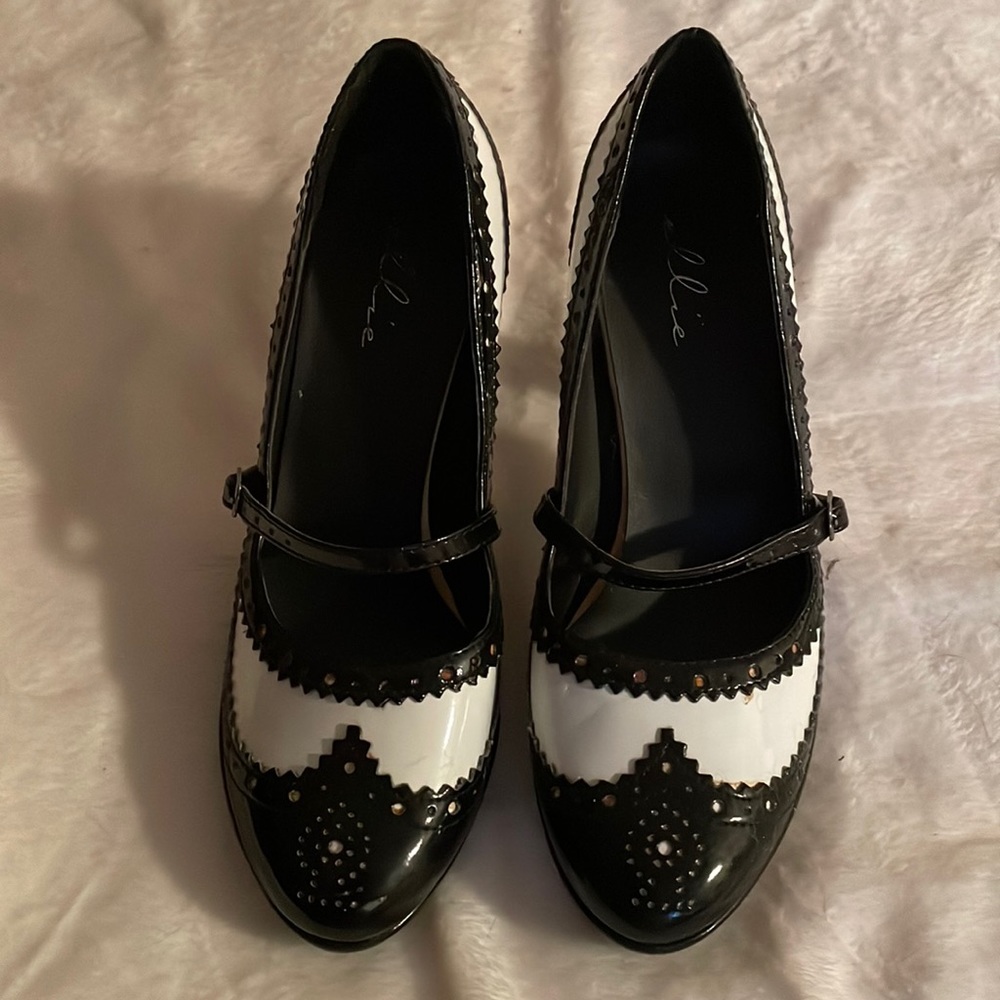 Black and white neat heels